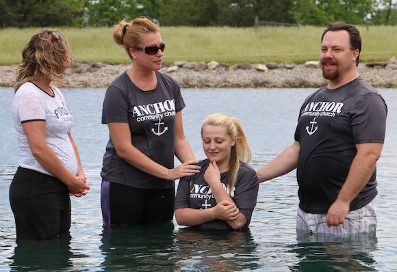 Alicia's baptism by Kevin Whitacre and Tomi Cardin.